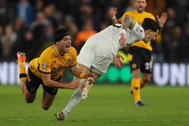 Raul Jimenez fouls Robin Koch during Leeds United's 3-2 win over Wolves. Pic: Geoff Caddick.