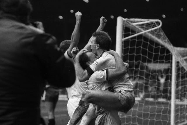Brendan Ormsby celebrates with Andy Ritchie after scoring what proved to the winning goal against Queens Park Rangers in the FA Cup fifth round clash at Elland Road in February 1987.