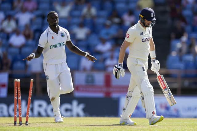 England's Chris Woakes leaves the field bowled by West Indies' Jayden Seales. (AP Photo/Ricardo Mazalan)