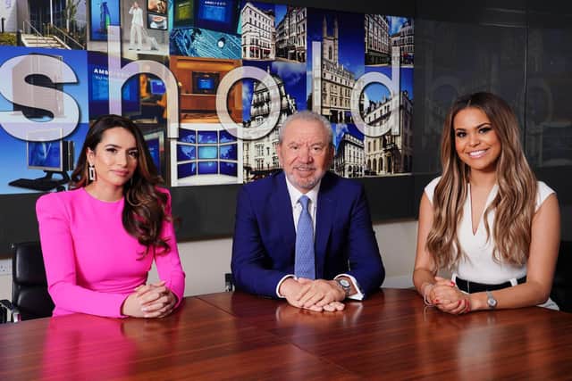 The finalists of the latest series of the BBC programme The Apprentice, Harpreet Kaur and Kathryn Burn with Lord Sugar in the boardroom of Amshold House in Loughton, Essex.