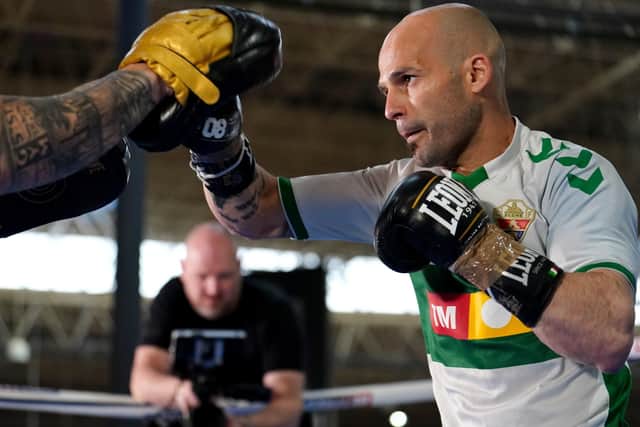 READY TO GO: Kiko Martinez warms up. Picture: Martin Rickett/PA Wire.