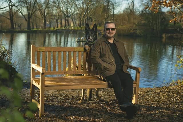Ricky Gervais and Brandy on a bench, Netflix has donated 25 benches to local councils around the UK as part of a mental health initiative celebrating the launch of the new series of Ricky Gervais' After Life. The benches were commissioned with suicide prevention charity the Campaign Against Living Miserably (Calm) and feature QR codes leading to online resources and a message of support. Issue date: Monday January 17, 2022.