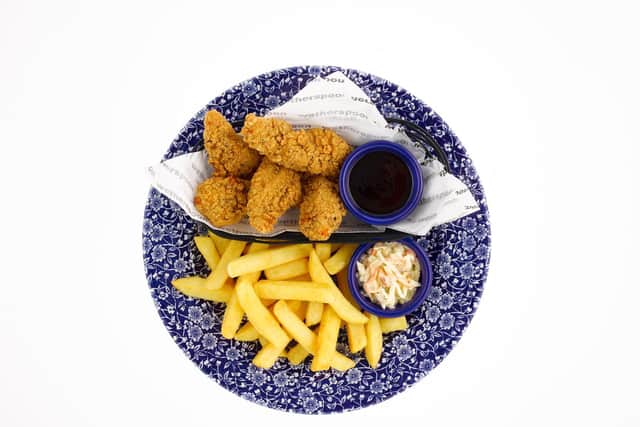 The pubs are introducing four boneless chicken dishes, each served in a basket. Photo: Wetherspoons