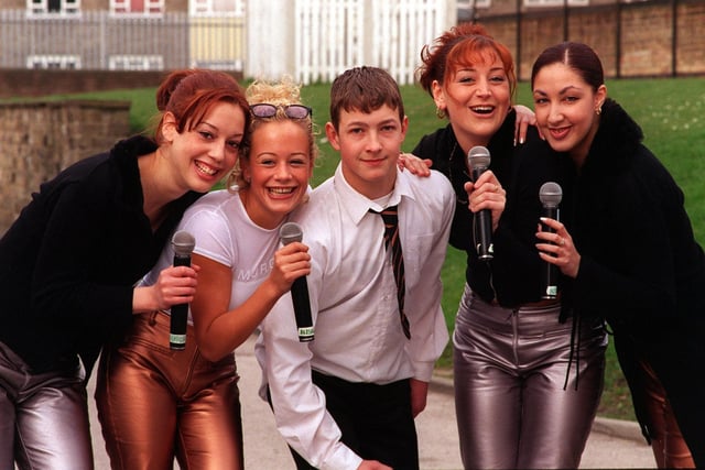 Top girl pop group Vanilla gave a concert for pupils at Agnes Stewart C of E with proceeds from the concert going to the fund to send pupil Danny McGuire on the In Great Britain Junior Lions tour of France. Pictured with Danny are band members , from left, Sharon Selby, Alison Potter, Frances Potter and Alida Swart.