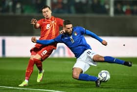 Gjanni Alioski prevents Domenico Berardi from scoring during North Macedonia's 1-0 World Cup Qualifying play-off semi-final victory over Italy. Pic: Claudio Villa