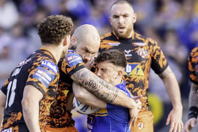 Leeds Rhinos' Liam TIndall is tackled by Castleford Tigers' George Griffin. Picture: Allan McKenzie/SWpix.com.