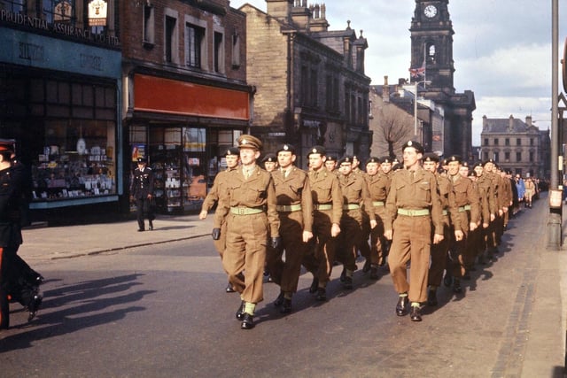Members of the TA (Territorial Army) marching in the procession from the Town Hall to Central Methodist Church behind the Salvation Army Band. This is longer than the TA existed in Morley; in fact the Drill Hall in Ackroyd Street was opened amid great flourish by General Baldock in 1912, but was closed a year after this parade. Morley Territorials were always connected with the Tank Regiment hence the black berets being worn.