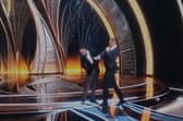 Smith walked up on stage and hit Rock before returning to his seat and shouting twice: “Keep my wife’s name out of your f****** mouth.”