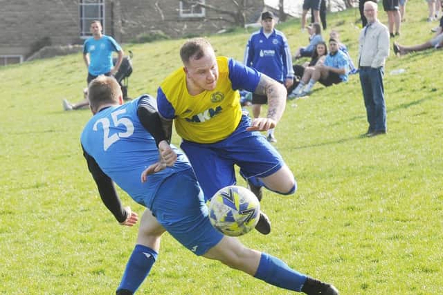 Runaway Yorkshire Amateur League Division 3 leaders Stanningley Old Boys beat bottom club Hanging Heaton Reserves 9-0 with Tom Stewart, pictured being  brought down by defender Danny Galpin, scoring three of them. Picture: Steve Riding.