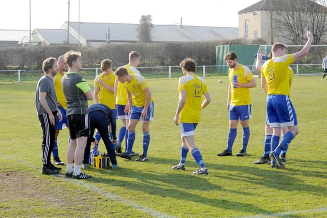 The referee agreed to a water break during Carlton Athletic's home West Yorkshire League win over Horsforth St Margarets owing to the unseasonably warm March sunshine. Picture: Steve Riding.