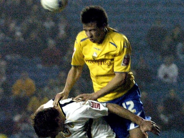 Preston's Sean St Ledger gets the better of Richard Cresswell.