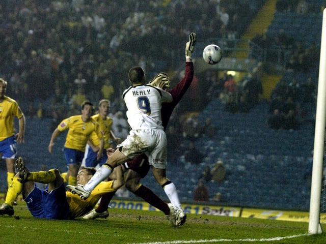 David Healy scores to win the game for the Whites.
