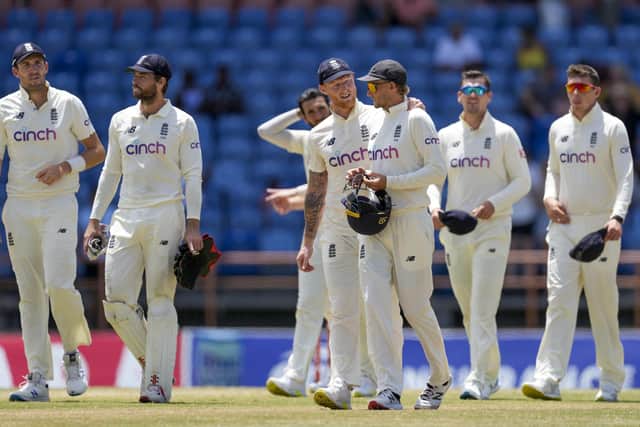 Dark day: England's Ben Stokes talks to his captain Joe Root after they lost by 10 wickets against West Indies. (AP Photo/Ricardo Mazalan)