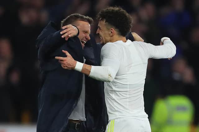BRIGHT SPARK: New Leeds United boss Jesse Marsch, left, and record signing Rodrigo embrace after last weekend's epic 3-2 success at Wolves. Photo by GEOFF CADDICK/AFP via Getty Images.