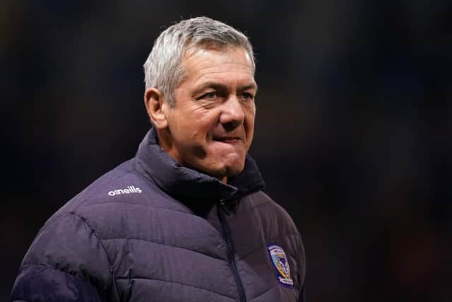 Warrington coach Daryl Powell was an hour before emerged from the dressing room to speak to the press after Sunday's Challenge Cup defeat to Wakefield, stating that his players need to "sort their heads out". Picture: Martin Rickett/PA Wire.