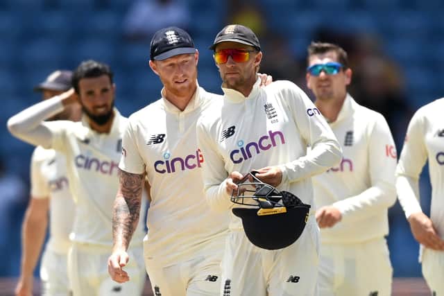England captain Joe Root is consoled by Ben Stokes after defeat in Grenada. (Photo by Gareth Copley/Getty Images)