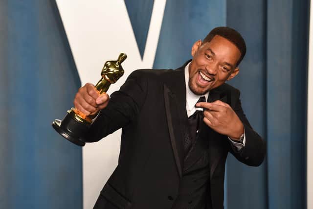 Actor Will Smith has issued a public apology to Chris Rock after slapping the comedian at the Oscars. PA.