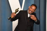 Actor Will Smith has issued a public apology to Chris Rock after slapping the comedian at the Oscars. PA.