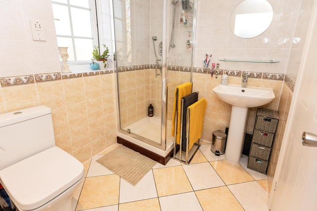 The family bathroom is spacious and comprises of a large corner jacuzzi bath, separate shower cubicle, W.C. and wash hand basin.