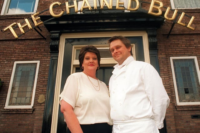 Chef Adrian Cole and bar supervisor Ann Cawley outside The Chained Bull in October 1996.