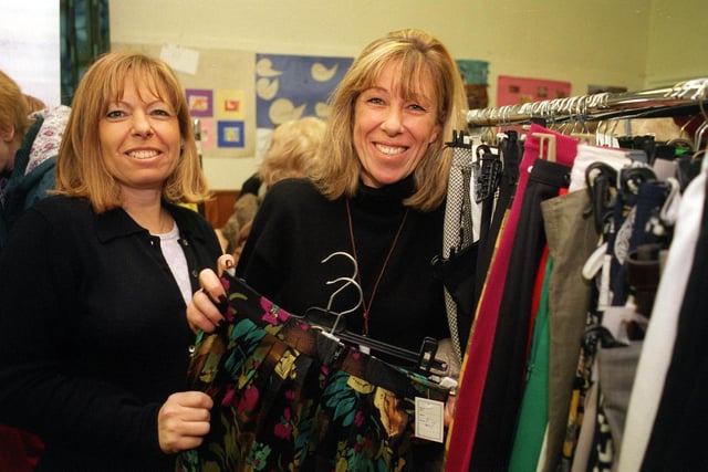 Liz Cohen (left) and her sister Linda Lever stack up the rails at the Leeds Wizo Annual Dress Sale held at St. John's Church Hall in Moortown in November 1998.