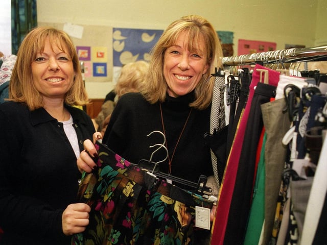 Liz Cohen, left, and her sister Linda Lever stack up the rails at the Leeds Wizo Annual Dress Sale held at St. John's Church Hall in Moortown in November 1998.