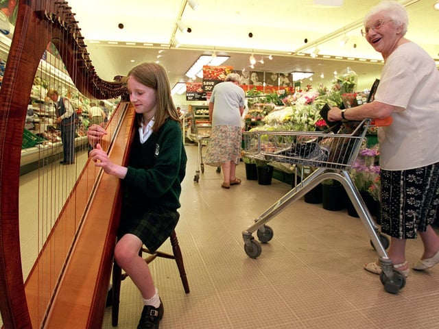 This is Millie Womack who was entertaining shoppers at Sainsbury's in Moortown with her harp playing in June 1999. Her efforts raised hundreds of pounds for the NSPCC.