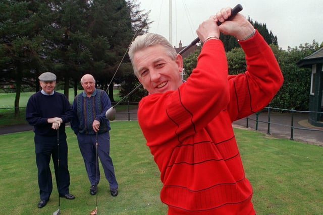 Moortown Golf Club's new captain Michael Craven drives off, watched by Bryon Hutchinson (left) and Malcolm Tain (vice captain) in February 1998.