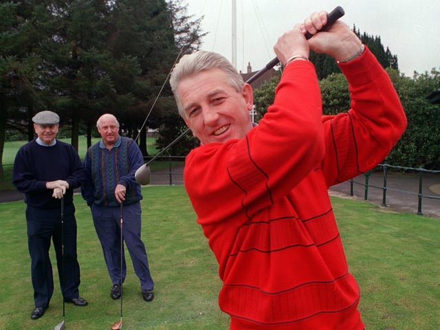 Moortown Golf Club's new captain Michael Craven drives off, watched by Bryon Hutchinson (left) and Malcolm Tain (vice captain) in February 1998.