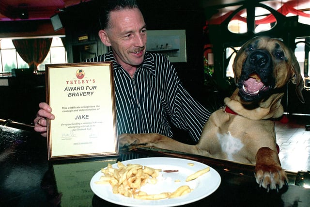 This is Ray Hubbard and dog Jake at the Chained Bull in Moortown in October 1998. Jake had been recognised for his bravery.