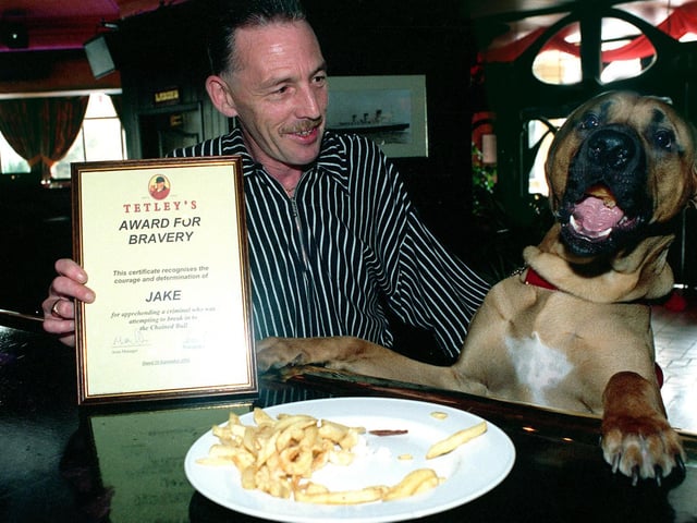 This is Ray Hubbard and dog Jake at the Chained Bull in Moortown in October 1998. Jake had been recognised for his bravery.
