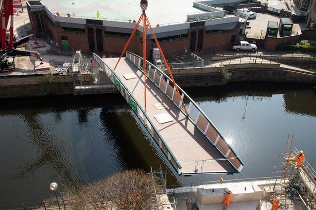 Engineers working on the David Oluwale bridge completed one of the project’s major milestones over the weekend, with cranes carefully placing the 40 tonne structure over the river where it will connect Sovereign Street to Water Lane.