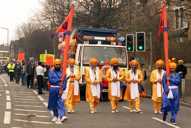 Five sword bearers head the procession down Chapeltown Road to Leeds Town Hall as local Sikhs celebrate the birth of Khalsa with the Festival of Vaisakhi.