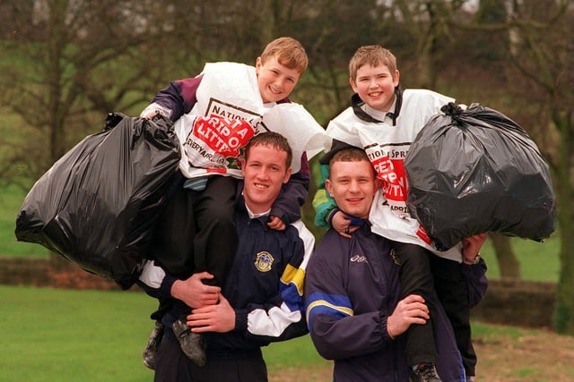 Leeds RL players visited Braim Wood High School to launch National Spring Clean Week. Pictured are players Dave Gibbons (left) and Paul Gleadhill wioth pupils Chris Millward (left) and Richard McHugh.