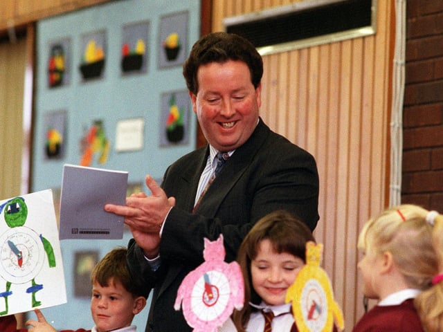 Head teacher Jim McHugh at Archbishop Cranmer C of E Primary with children during the school assembly in November 1996.