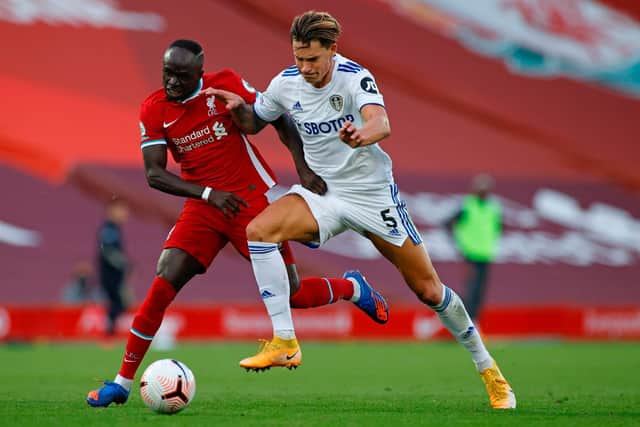 Robin Koch gets to grips with Sadio Mané during Leeds United's 4-3 defeat to Liverpool on the opening day of the 2020/2021 Premier League season. Pic: Phil Noble.