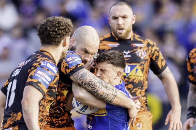 Leeds Rhinos' Liam TIndall is tackled by Castleford's George Griffin during Saturday's Challenge Cup clash. Picture: Allan McKenzie/SWpix.com.