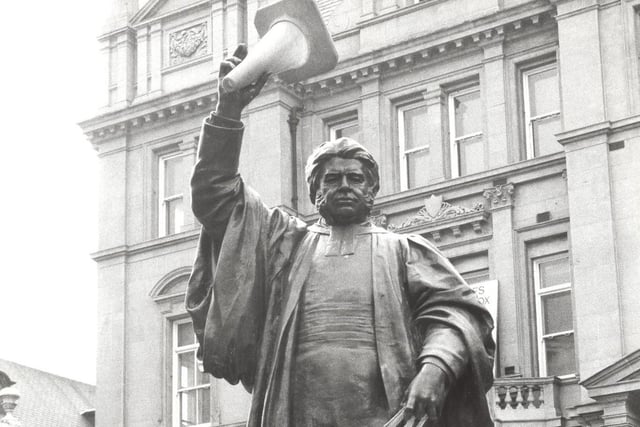 Dr Walter Hook, former Vicar of Leeds and champion of workers' rights go to grip with another social cause. This time its a silent protest at no-parking areas in July 1978. The raised hand become a warning gesture to traffic wardens.