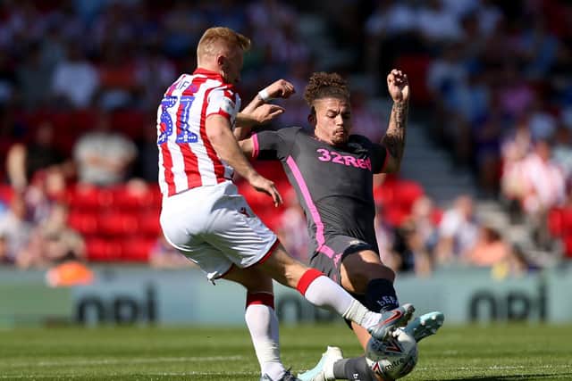 Kalvin Phillips goes in for a tackle on Stoke City's Mark Duffy. Pic: Lewis Storey.