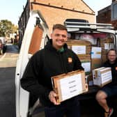 Kev Carney (right) with colleague Elliott Chadwick, packing the van before the trip to Poland to drop off supplies for Ukrainian refugees.