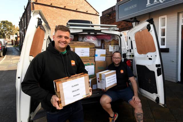 Kev Carney (right) with colleague Elliott Chadwick, packing the van before the trip to Poland to drop off supplies for Ukrainian refugees.