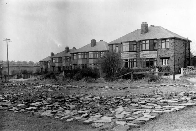 Houses of Moss Valley at the edge of playing fields belonging to Moortown Rugby Union Club, Alwoodley Park , in April 1951.