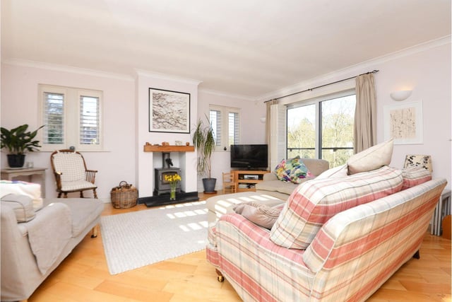 It is a spacious room perfect for family to sit around the fire and relax. It benefits from a large glass window overlooking the stairs leading down to the bedrooms and a Juliet balcony capturing the garden vista.