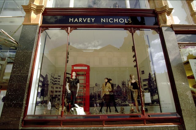 Window dressing at Harvey Nichols on Briggate. The backdrop is a London scene with St Paul's Cathedral and Westminster Abbey depicted.