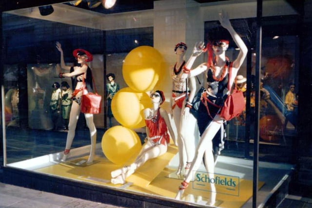 The windows of Schofield's department store in The Headrow showcasing summer fashions in swimwear. Schofield's closed in 1996 and the site was redeveloped as The Headrow Centre.