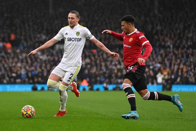 Luke Ayling on the ball during Leeds United's 4-2 defeat to Manchester United. Pic: Shaun Botterill.