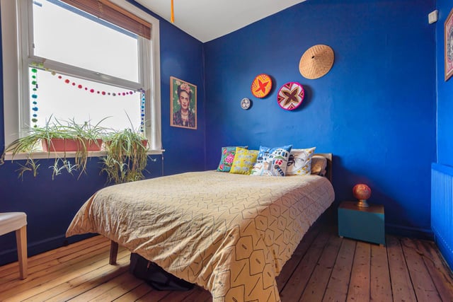 The third bedroom is located to the rear of the property. The double sized bedroom is painting in a bright blue and is a beautifully bright and cheerful space.