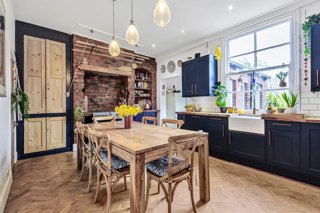 The kitchen is bursting with character. The modern colour palette and kitchen units contrast beautifully with character elements such as exposed brickwork and characterful doors.