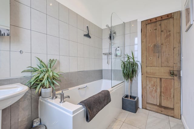 The house bathroom features a three-piece suite and is a bright and airy space.