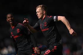 IMPRESSED: Southampton captain James Ward-Prowse races off to celebrate after netting a superb free-kick to give the Saints a 1-1 draw against Leeds United - a side the England international had warm words for. Photo by Stu Forster/Getty Images.